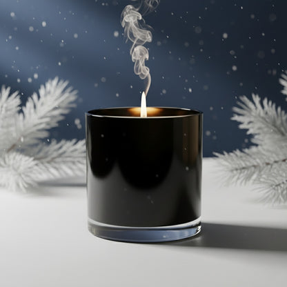 Black candle with smoke against a snowy background