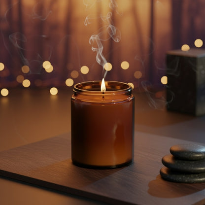 Candle in an amber jar with a lit wick and smoke, on a wooden surface with blurred lights in the background.