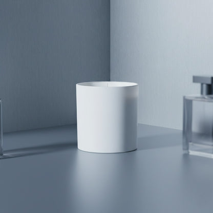 White cylindrical container on a reflective surface with a gray background