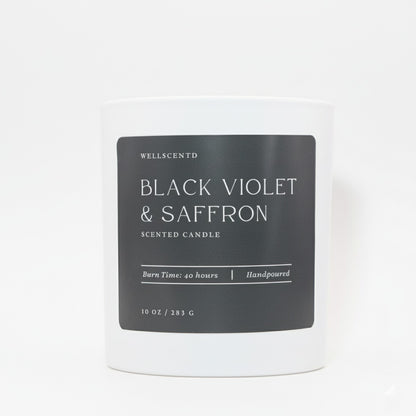 Wellscentd black violet & saffron scented candle on a white background