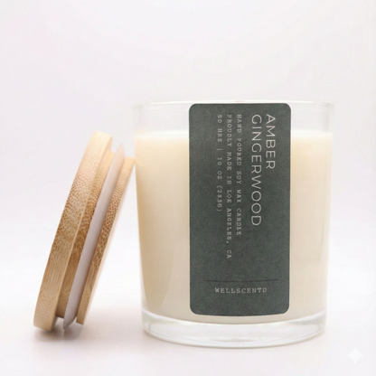 Candle with a wooden lid and black label on a white background