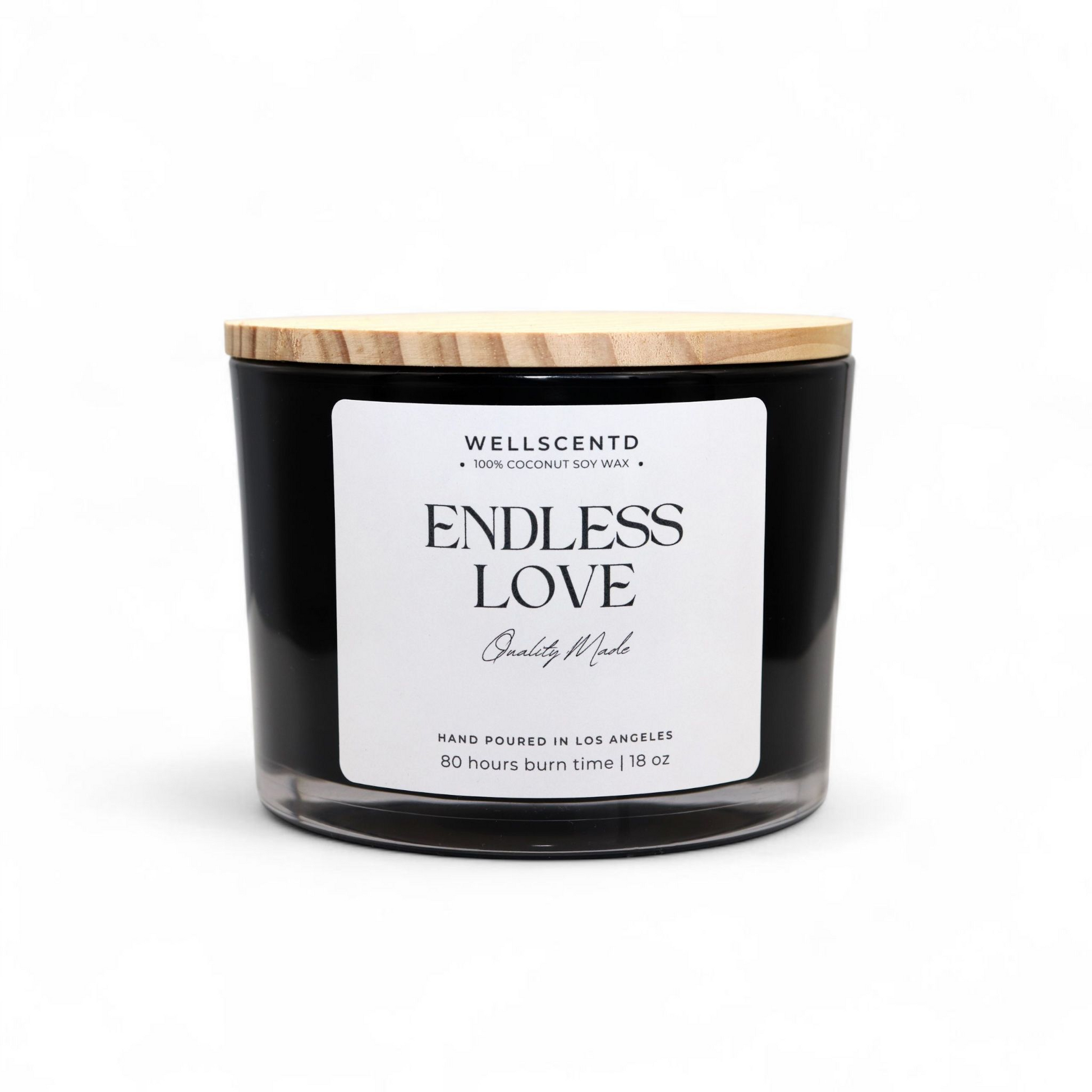 Black candle with a wooden lid labeled 'Endless Love' by Wellscentd on a white background