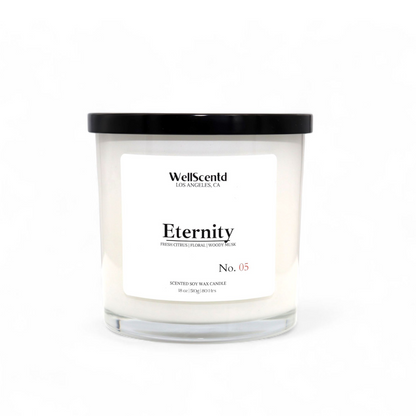Wellscentd Eternity candle in clear glass jar with black lid – 18oz soy wax blend, masculine fragrance with citrus, jasmine, and amber, product photo on white background.