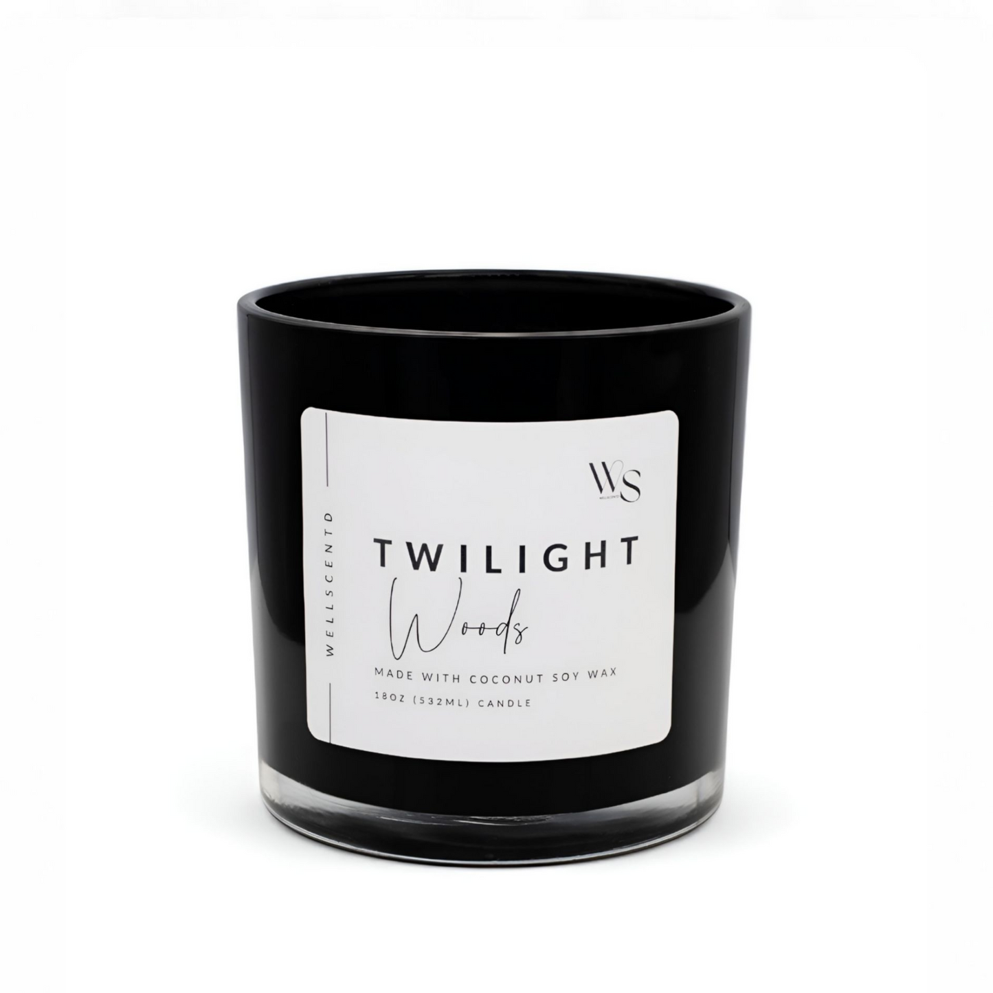Black candle with a white label on a white background