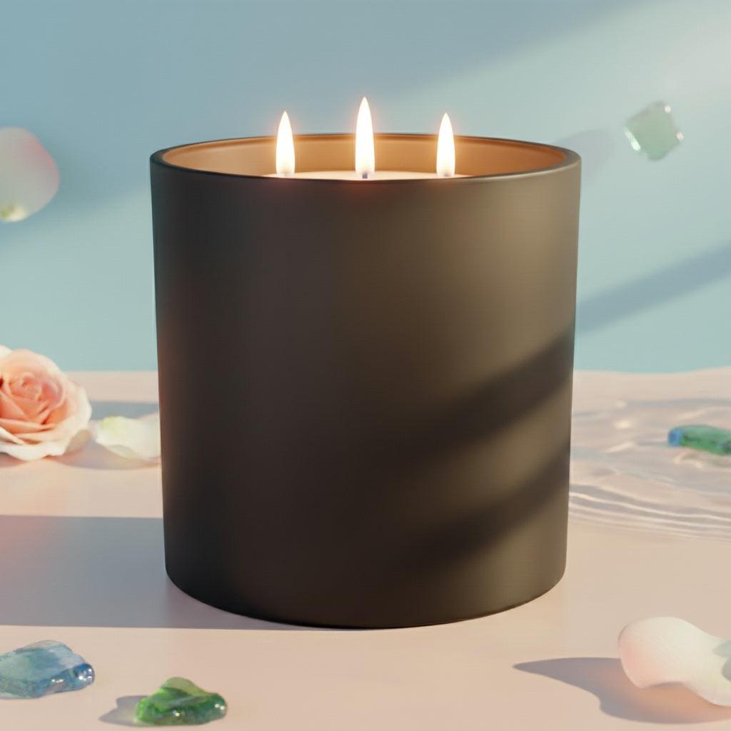 18oz Wellscentd Ocean Rose Candle in a luxury black jar.