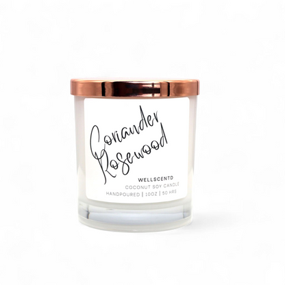 Wellscentd Coriander Rosewood candle in white glass jar – 10oz coconut soy wax, fresh citrus and warm woodsy fragrance, minimalist label, product photo on white background.