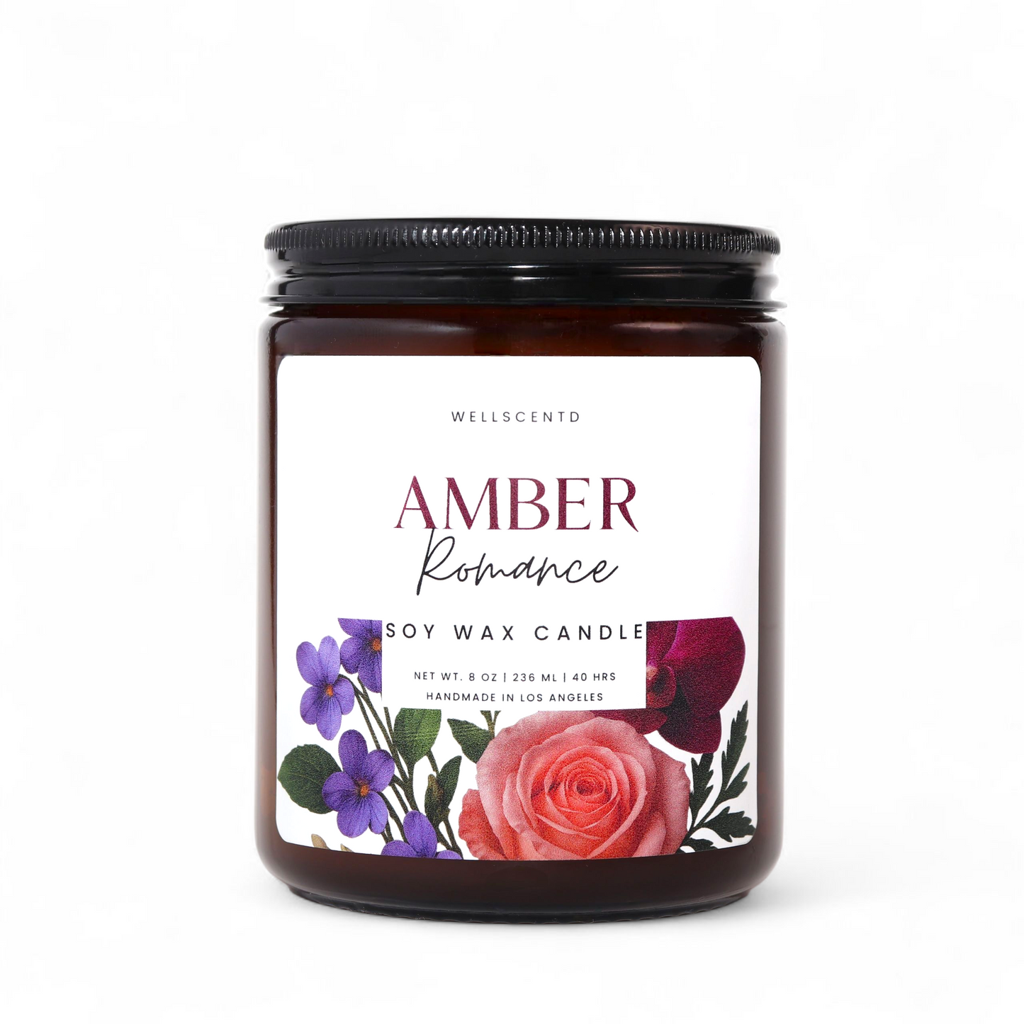 Wellscentd Amber Romance soy wax candle with floral label on a white background