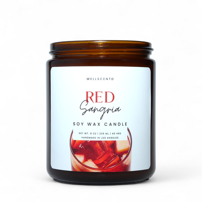 Wellscento Red Sangria soy wax candle with a label on a white background