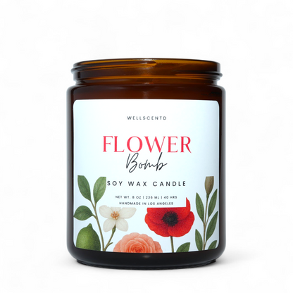 Soy wax candle labeled 'Flower Bomb' with floral design on a white background