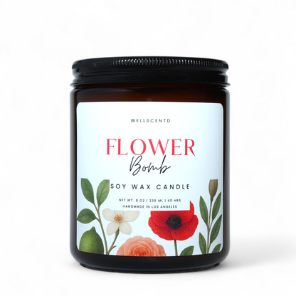 Soy wax candle labeled 'Flower Bomb' with floral design on a white background